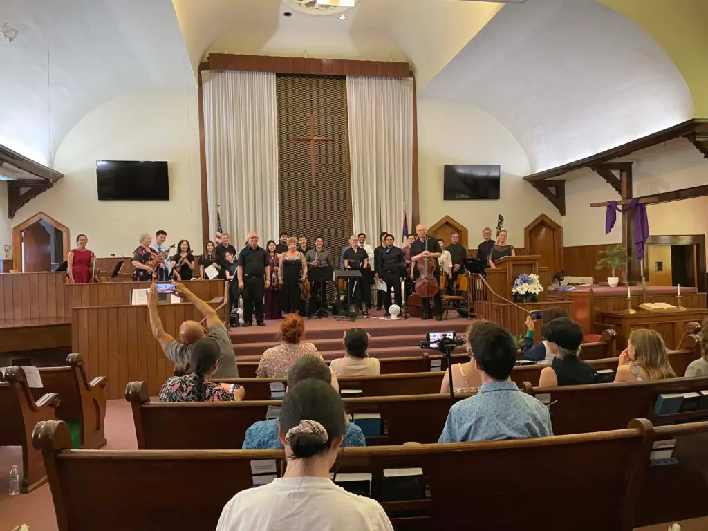 image of musical concert in front of the church